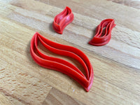 Earring cutters and hair barrette